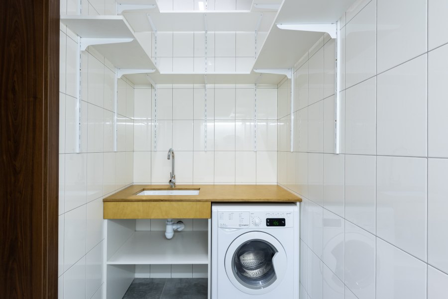 A washing machine integrated in the kitchen